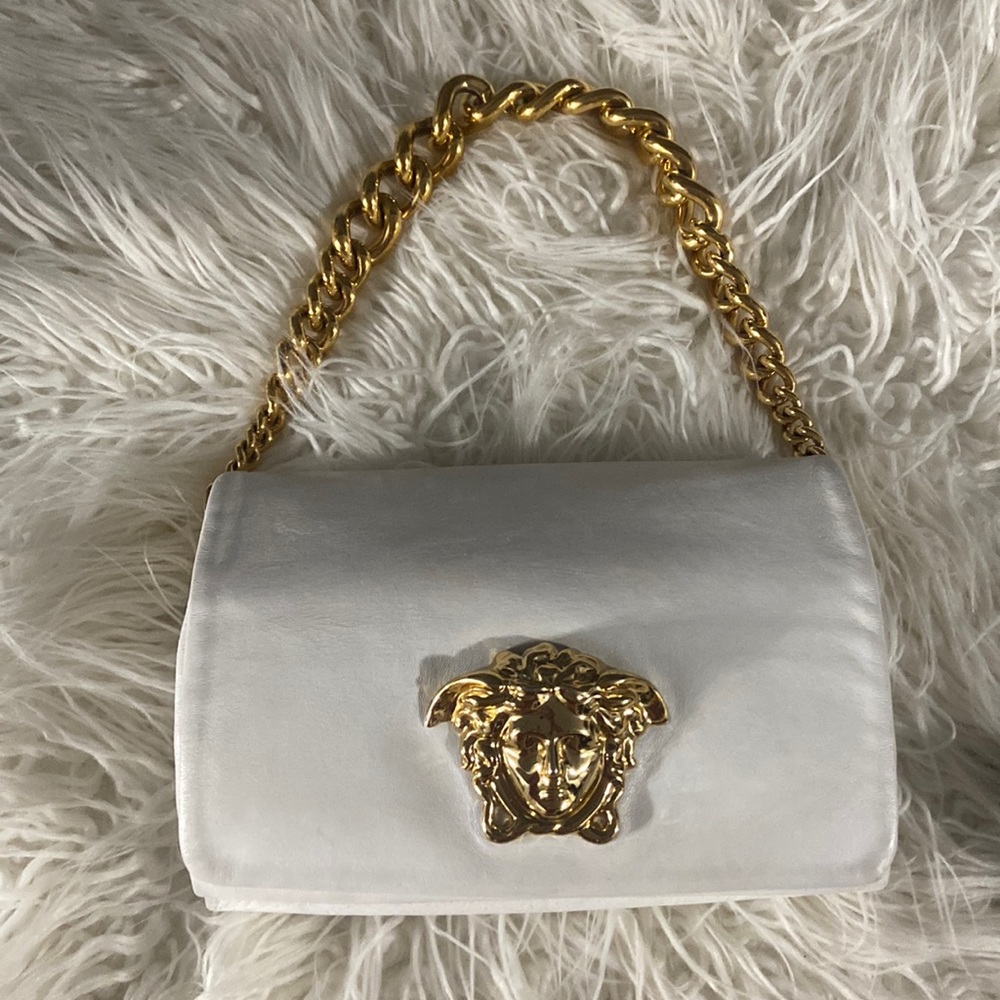 White and gold Versace purse